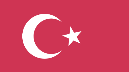 a red field with a central white star and crescent